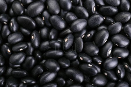 Foto de Muchos frijoles negros crudos como fondo, primer plano - Imagen libre de derechos