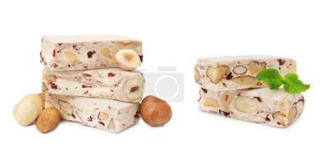 Köstliche Nougat, Minze und Nüsse auf weißem Hintergrund