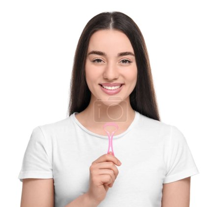 Happy woman with tongue cleaner on white background