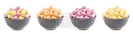 Photo for Set of bowls with colorful corn puffs on white background - Royalty Free Image