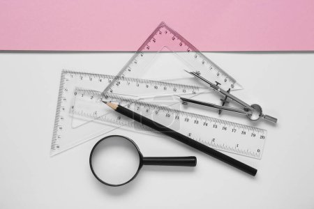 Photo for Flat lay composition with different rulers, pencil and compass on color background - Royalty Free Image