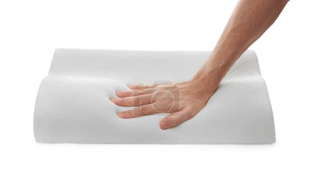 Photo for Man touching orthopedic memory foam pillow on white background, closeup - Royalty Free Image
