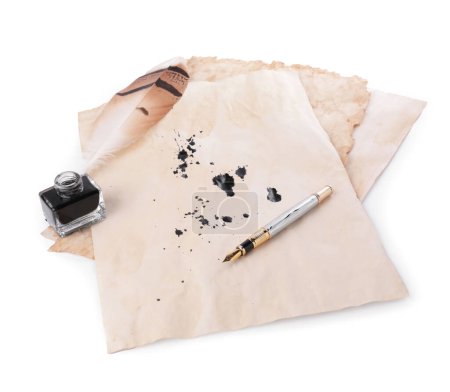 Photo for Parchment with stains of ink, feather pen and inkwell on white background - Royalty Free Image