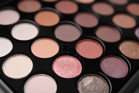 Photo for Beautiful eyeshadow palette as background, closeup. Professional cosmetic product - Royalty Free Image