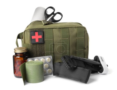 Photo for Military first aid kit, tourniquet, pills and tools on white background - Royalty Free Image