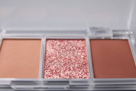 Photo for Beautiful eyeshadow palette on light background, closeup. Professional cosmetic product - Royalty Free Image