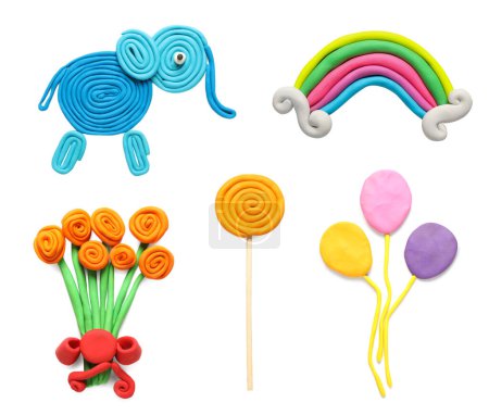 Set with different colorful child's crafts of plasticine on white background, top view