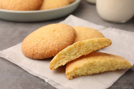 Delicious Danish butter cookies on grey table, closeup