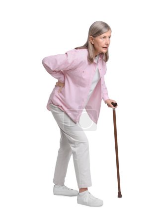 Photo for Senior woman with walking cane suffering from back pain on white background - Royalty Free Image