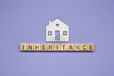Photo for Word Inheritance made with wooden cubes and house model on color background, flat lay - Royalty Free Image