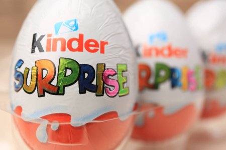 Photo for Slynchev Bryag, Bulgaria - May 25, 2023: Kinder Surprise Eggs on blurred background, closeup. Space for text - Royalty Free Image
