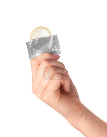 Woman holding condom on white background, closeup