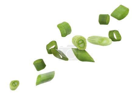 Photo for Cut green onion falling on white background - Royalty Free Image