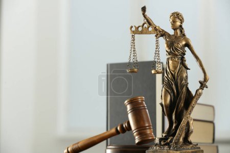 Photo for Figure of Lady Justice, gavel and books on white background, space for text. Symbol of fair treatment under law - Royalty Free Image