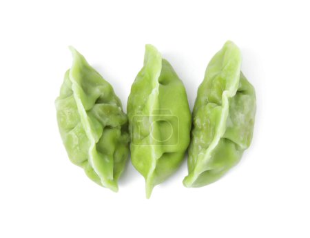 Téléchargez les photos : Délicieuses boulettes vertes (gyozas) isolées sur blanc, vue de dessus - en image libre de droit