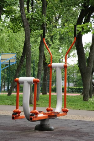 Empty outdoor gym with ovate stepper in park