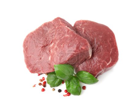Fresh beef meat, basil leaves and spices isolated on white, top view