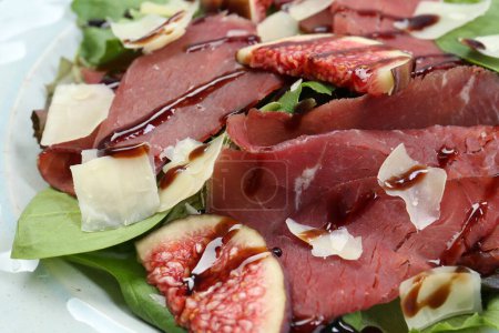Photo for Delicious bresaola salad on plate, closeup view - Royalty Free Image