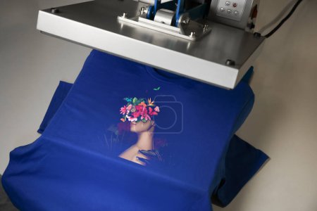 Photo for Custom t-shirt. Using heat press to print creative image of woman with beautiful flowers - Royalty Free Image
