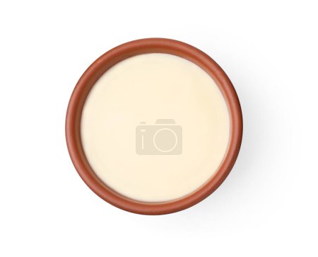 Téléchargez les photos : Bol avec lait condensé isolé sur blanc, vue de dessus - en image libre de droit