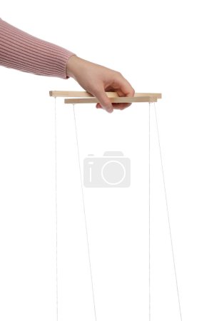 Photo for Woman pulling strings of puppet on white background, closeup - Royalty Free Image