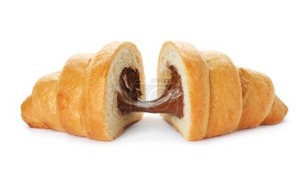 Delicious cut croissant with chocolate isolated on white