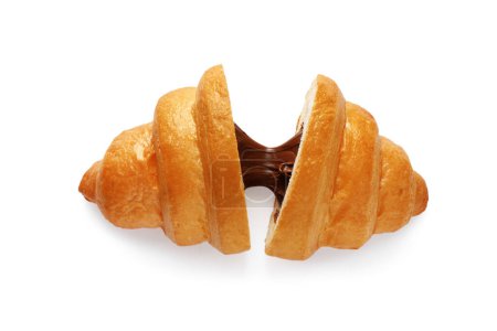Delicious cut croissant with chocolate isolated on white, top view