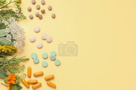 Photo for Different pills, herbs and flowers on light yellow background, flat lay with space for text. Dietary supplements - Royalty Free Image