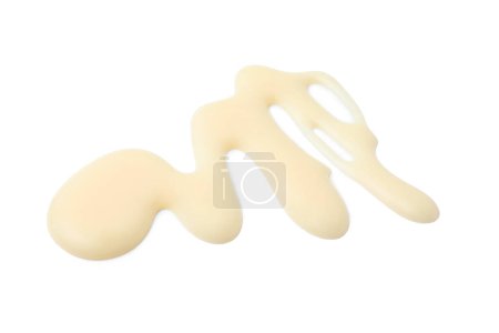 Téléchargez les photos : Déversement savoureux lait condensé isolé sur blanc - en image libre de droit
