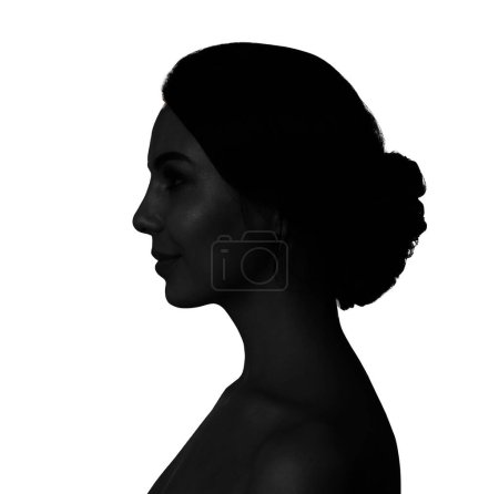Foto de Silueta de mujer aislada en blanco, retrato de perfil - Imagen libre de derechos
