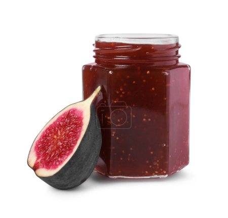 Glass jar with tasty sweet jam and half of fresh fig isolated on white