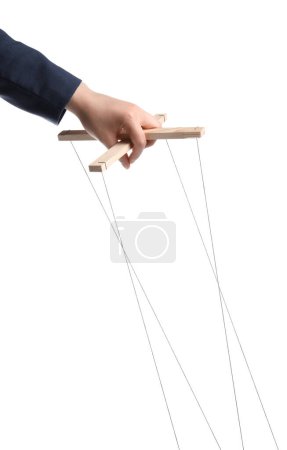 Photo for Businesswoman holding puppet control bar with strings on white background, closeup - Royalty Free Image