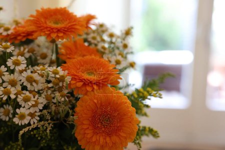 Photo for Fresh bouquet of chamomile and calendula flowers, closeup. Space for text - Royalty Free Image