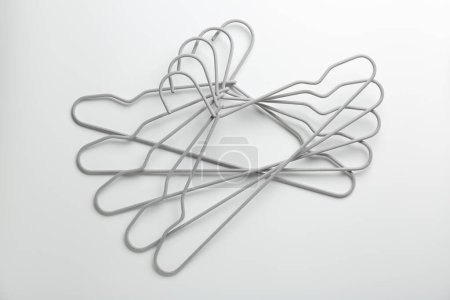 Photo for Many hangers on white background, top view - Royalty Free Image