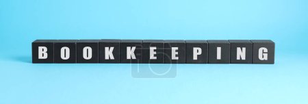Word Bookkeeping made with black cubes on light blue background