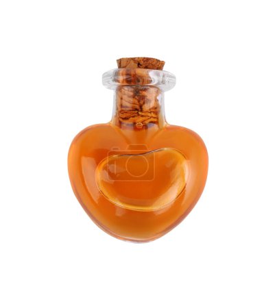 Bottle of love potion isolated on white, top view