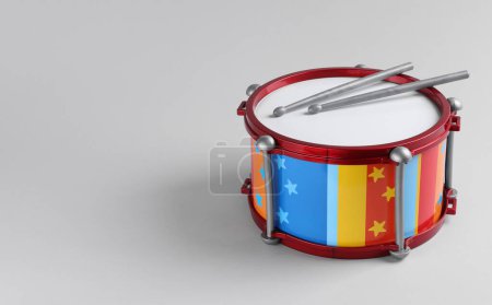 Colorful drum and sticks on light background. Percussion musical instrument