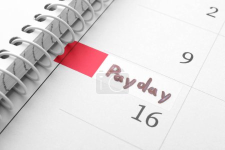 Photo for Calendar page with marked payday date as background, closeup - Royalty Free Image