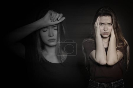 Woman suffering from mental illness on black background. Dissociative identity disorder