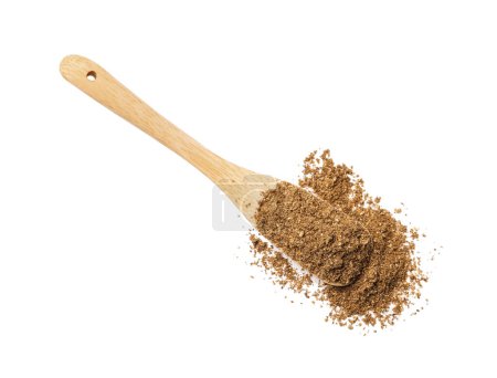 Wooden spoon of aromatic caraway (Persian cumin) powder isolated on white, top view