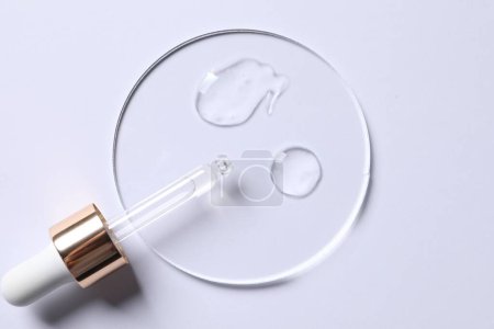 Photo for Samples of cosmetic serum and pipette on white background, top view - Royalty Free Image