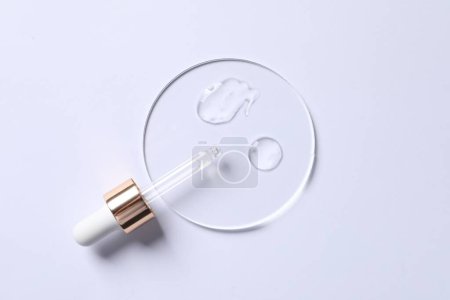 Photo for Samples of cosmetic serum and pipette on white background, top view - Royalty Free Image
