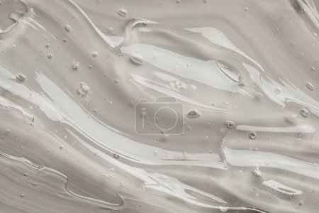 Photo for Clear cosmetic gel on grey background, top view - Royalty Free Image