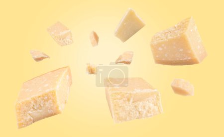 Parmesan cheese in air on pale yellow background, banner design