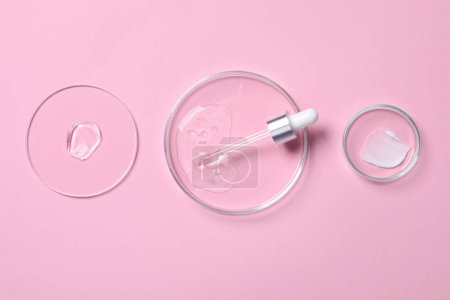 Photo for Pipette, cosmetic serum and petri dishes with samples on pink background, flat lay - Royalty Free Image