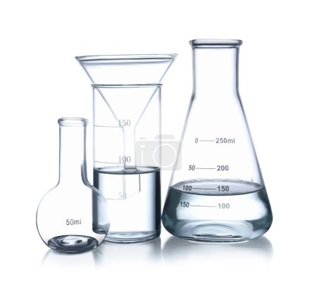 Different laboratory glassware with water isolated on white
