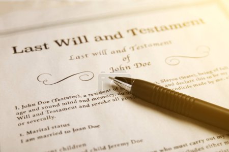 Last Will and Testament with pen, closeup