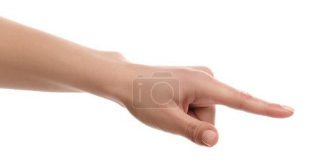 Mujer señalando con el dedo índice sobre fondo blanco, primer plano