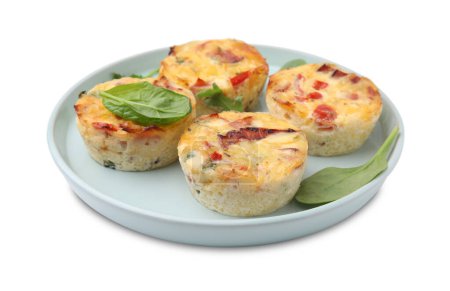 Freshly baked bacon and egg muffins with cheese isolated on white