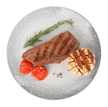 Delicious grilled beef steak with tomatoes and spices isolated on white, top view